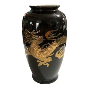 Mini Chinese Vase with Golden Dragon design. 
5”L x 2.5 W with 2” opening.